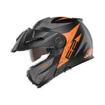 Sidovy av Schuberth öppningsbar mc-hjälm E2 Explorer Orange med robust konstruktion och tydliga orangea grafiska detaljer.